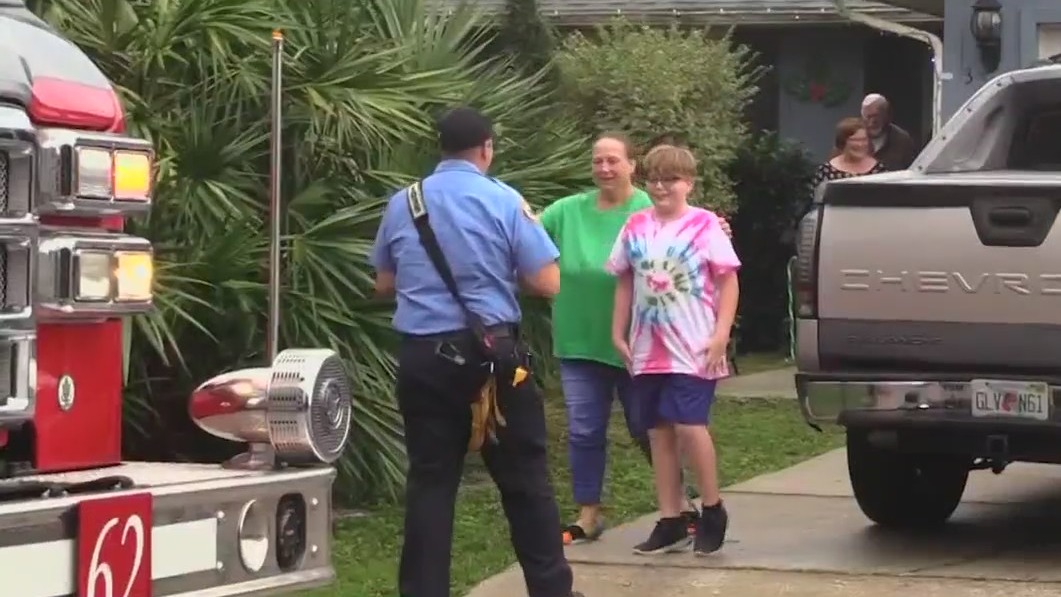Florida firefighters surprise 11-year-old boy they helped deliver a decade earlier